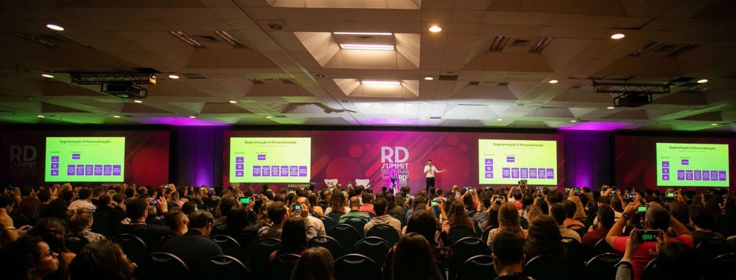 Audience photographing Rafael’s segmentation presentation at RD Summit.